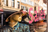 Mannequin behind a window displaying sales